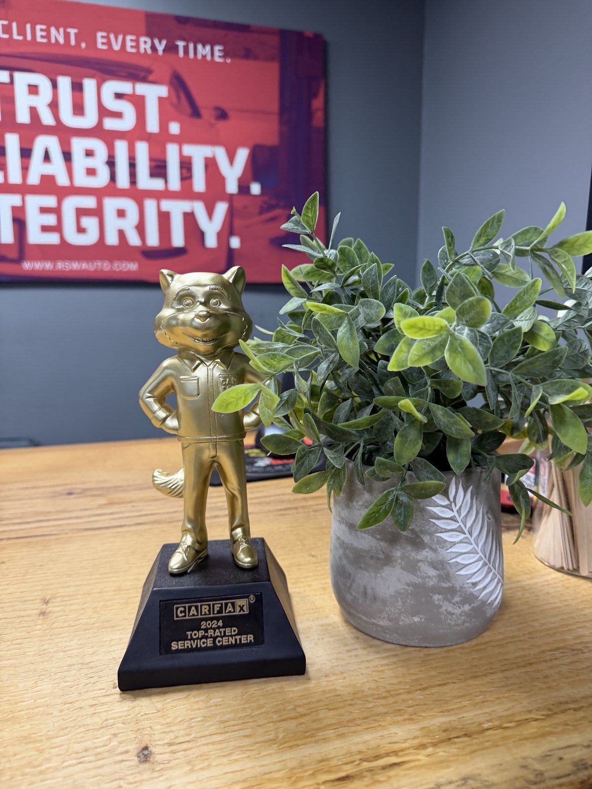 Carfax Top-Rated Service Center trophy on the front desk at RSW European Auto Repair - Kinnelon