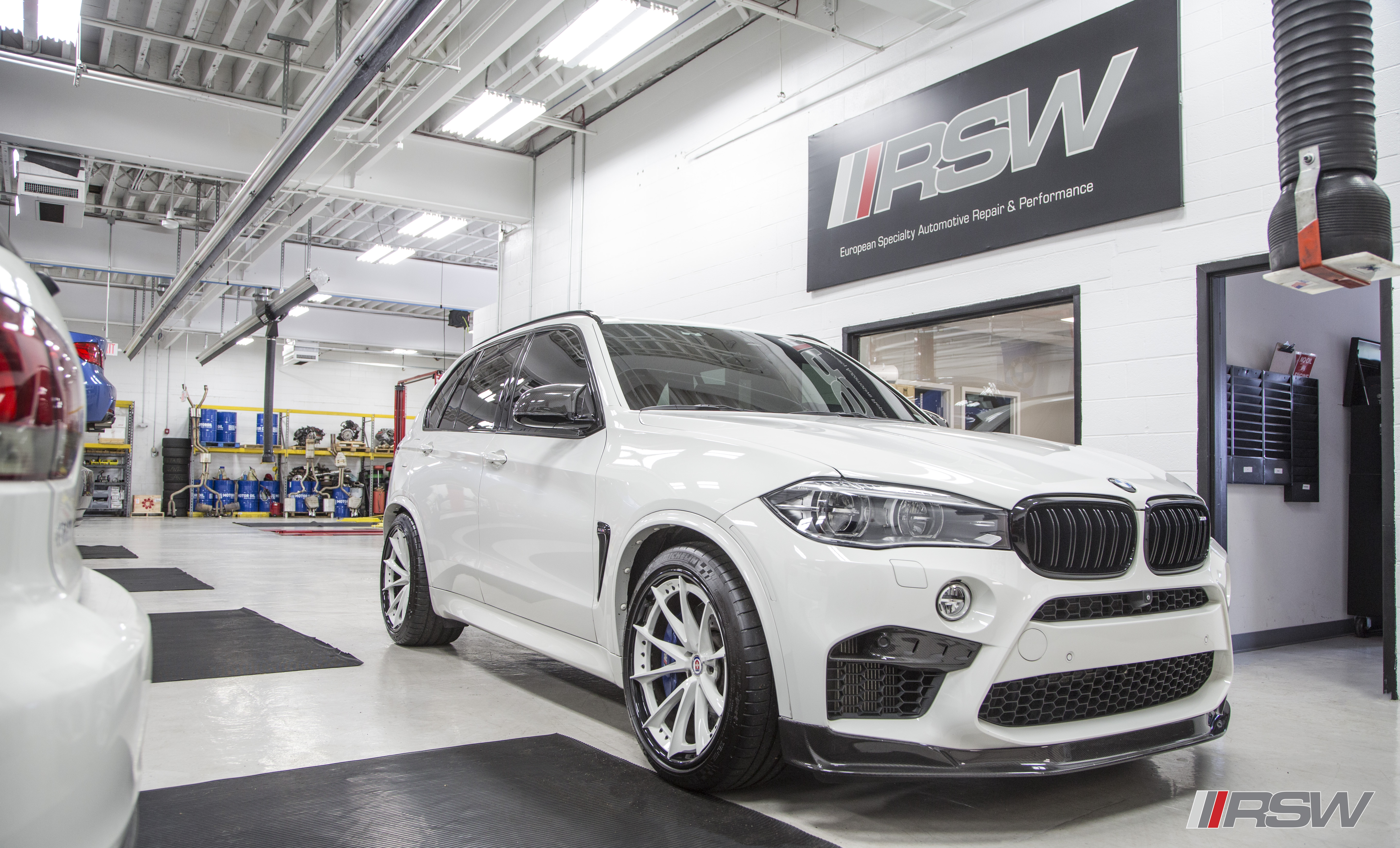 White BMW X5 M in the RSW Euro shop