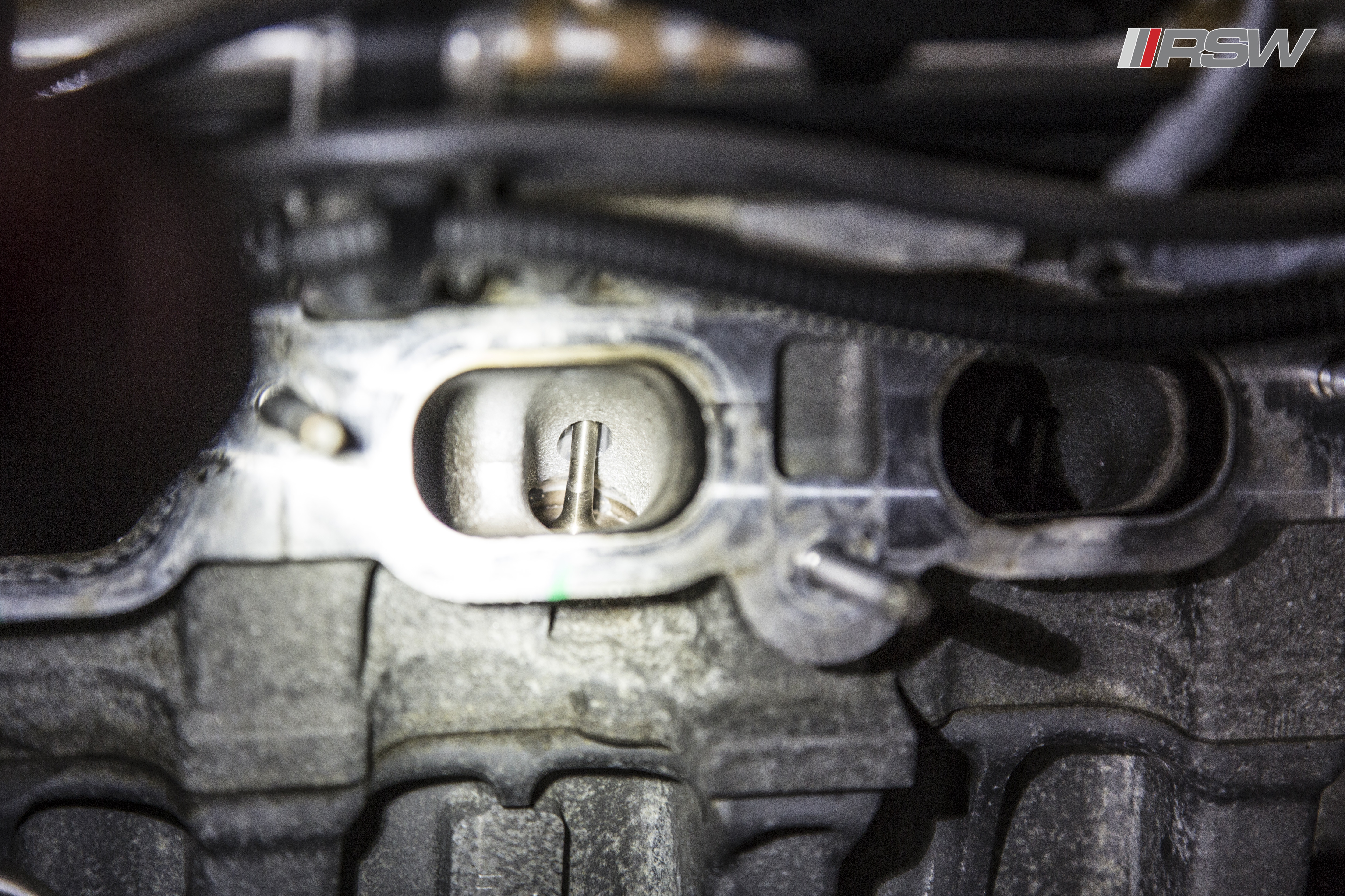 Carbon buildup in intake ports before cleaning at RSW Euro