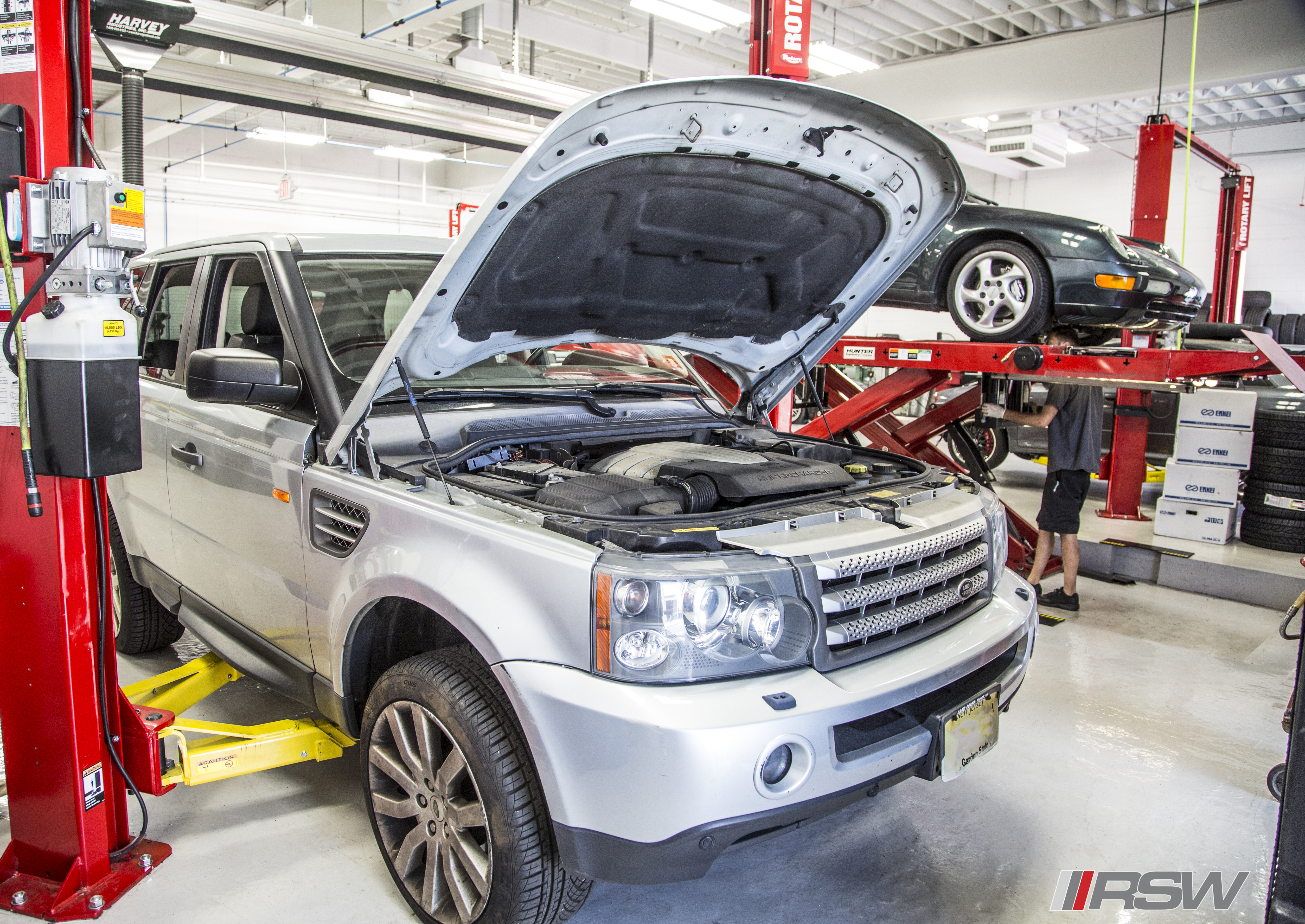 Silver Land Rover on the lift in the RSW Euro shop