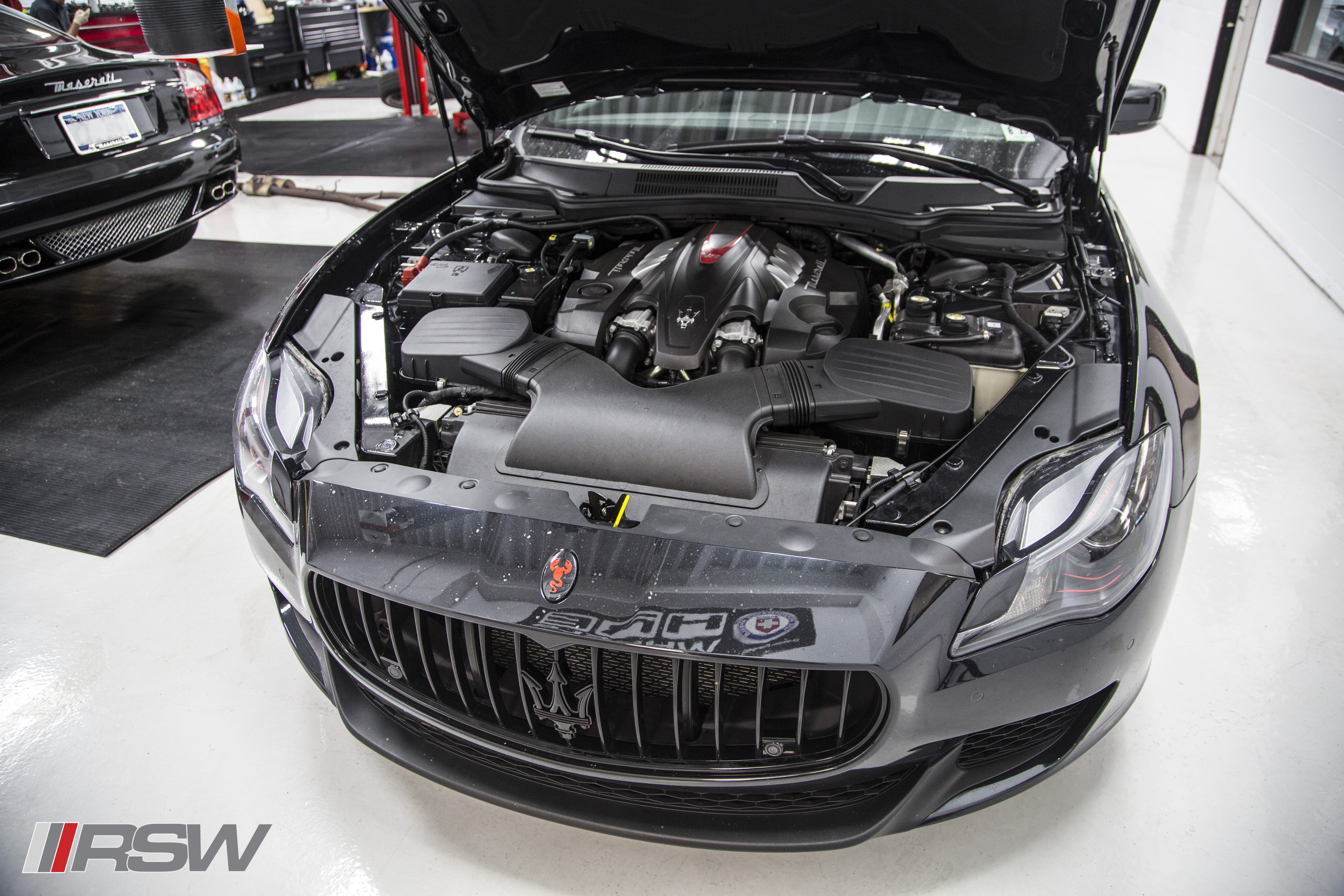 Maserati with the hood open in the RSW Euro shop